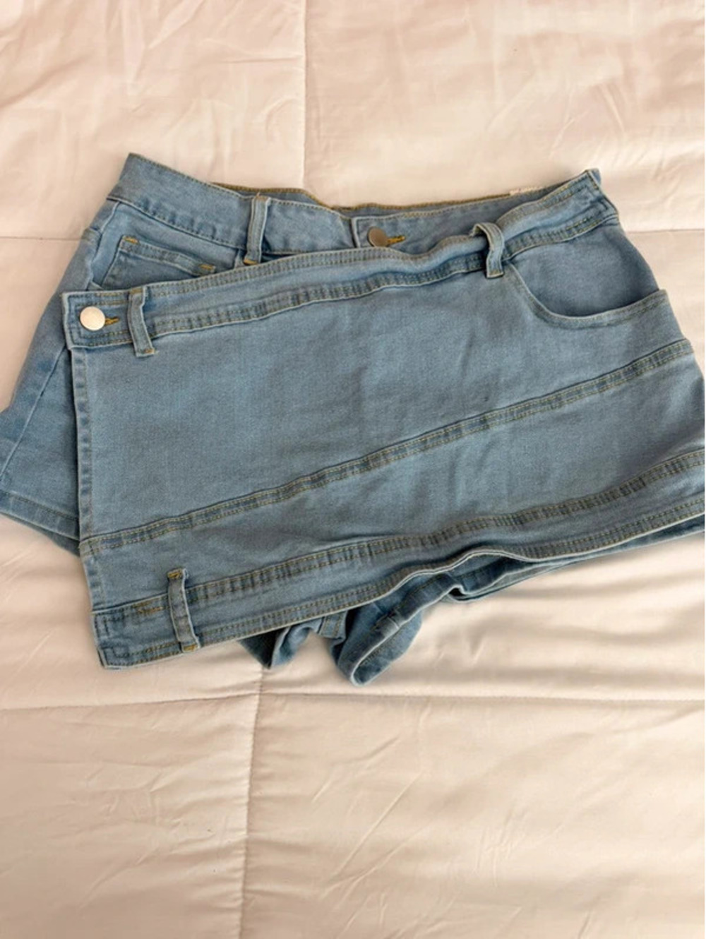 Blue denim mini skirt with shorts underneath, size L
